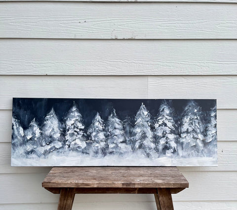 trees with snow on navy